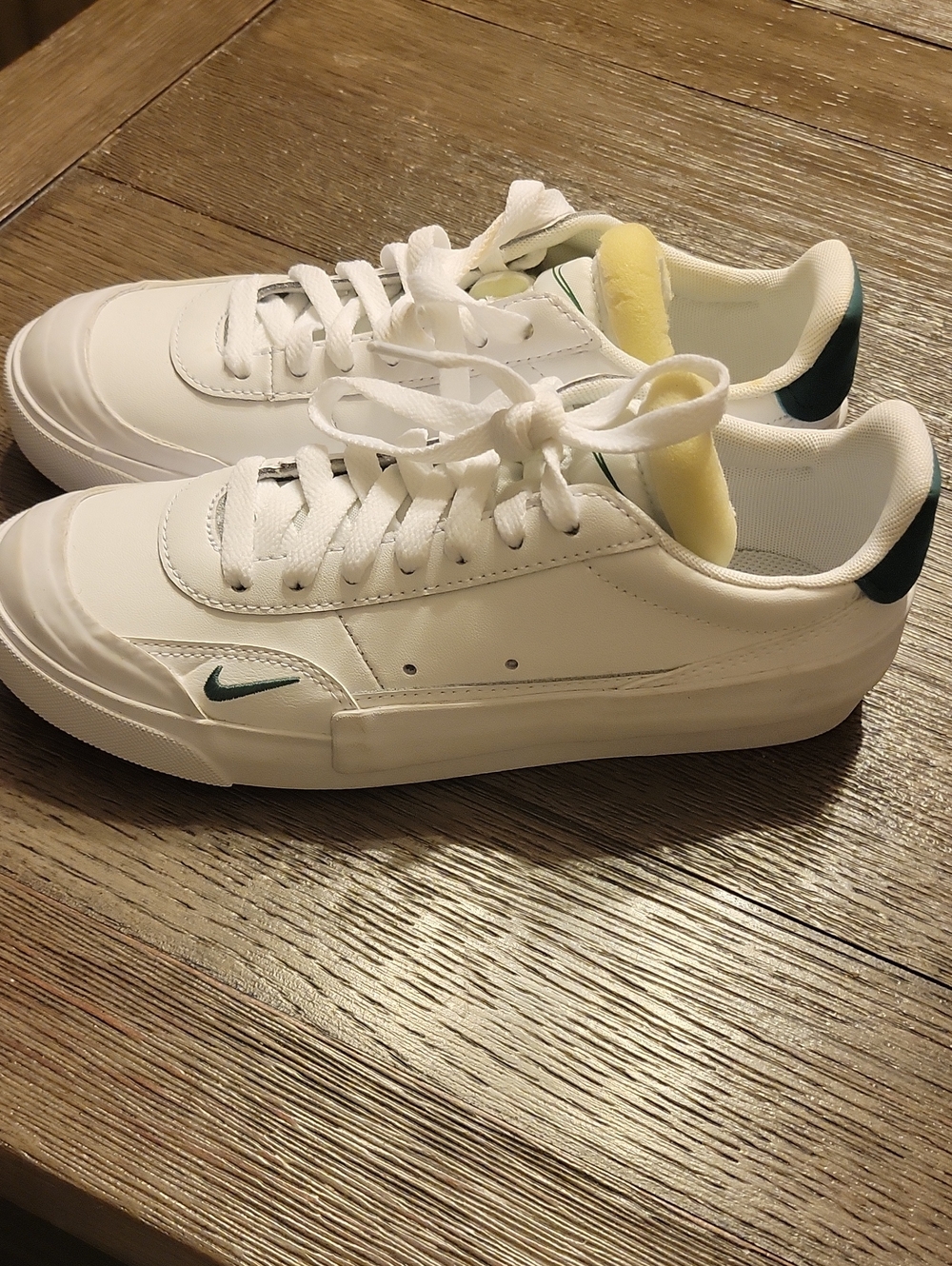 Nike Men’s White Low-Top Sneakers with Dark Green Swoosh